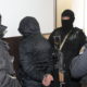 Şantaj şi datorii artificiale. Membrii grupării Kitaeţ, în judecată